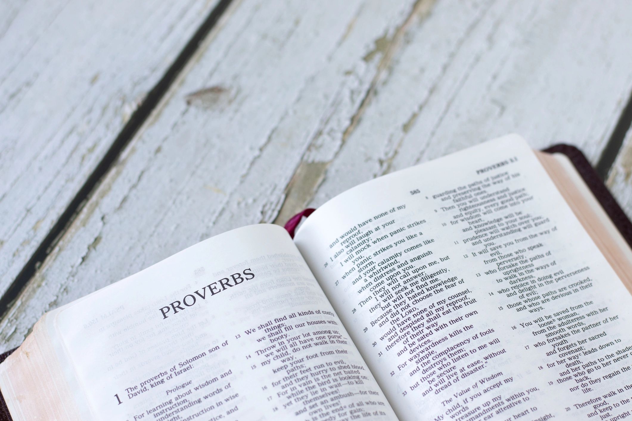 Open Bible on a wooden table